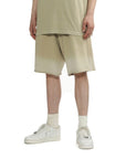 IZZUE - Spray distress shorts beige - BACKSTAGE - باك ستيج - BACKSTAGE باك ستيج your go-to destination for discovering the finest brands that cater to every taste and occasion in KSA and Middle East.